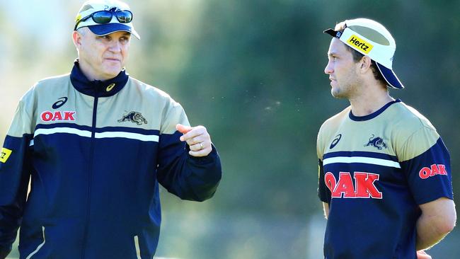 Matt Moylan talks to Panthers coach Anthony Griffin. Picture: Jenny Evans