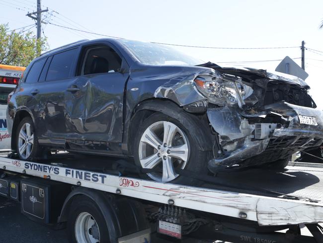 The Toyota Kluger is taken away from the scene. Picture: Hollie Adams/The Australian