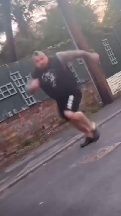 'Rip your head off' World's strongest man chases down car