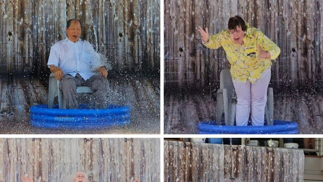 Former Lions District Govenor's (from left) Peter Ho, Kim Forrest, Ian Bruning and David Greenup get dunked to raise money for those affected by the recent bushfires around Millmerran Downs.