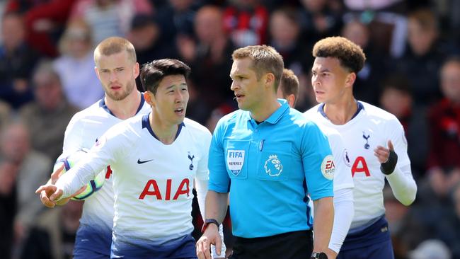 Tottenham’s Son Heung-Min confronts referee Craig Pawson after he was red carded against Bournemouth. Picture: Getty Images