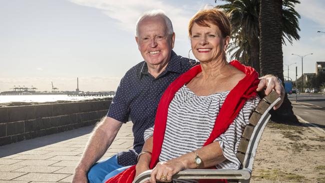 Lee and Barry McCormack say living by the beach has helped them to keep fit. Picture: Jake Nowakowski