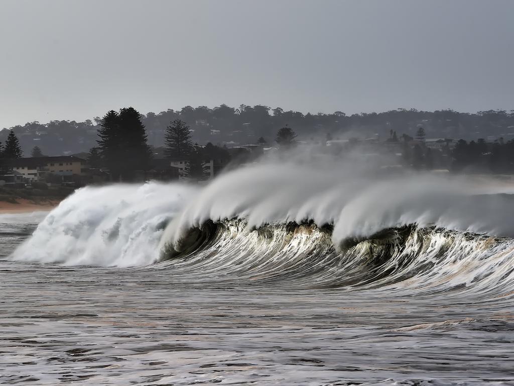 MANLY DAILY/AAP. Big surf pounded Collaroy Beach on Tuesday, June 4. Big seas, strong winds and rain lashed the East Coast of NSW today. AAP IMAGE / Troy Snook)