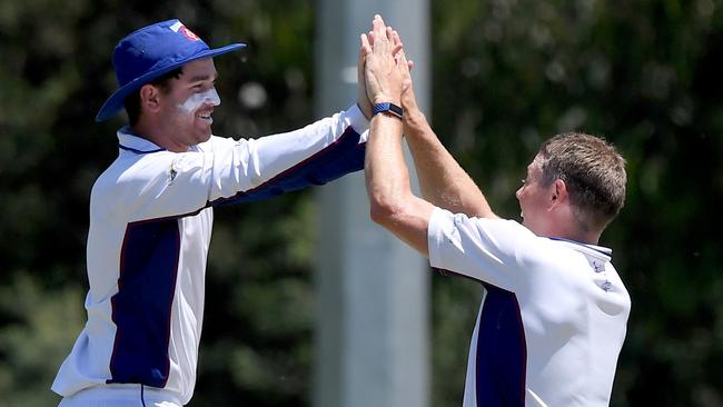 Banyule celebrates a wickt during its loss to Macleod on Saturday. Picture: Andy Brownbill