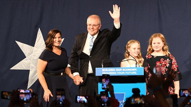 Prime Minister Scott Morrison (centre) arrives with his family to deliver his victory speech following the 2019 federal election. Picture: AFP