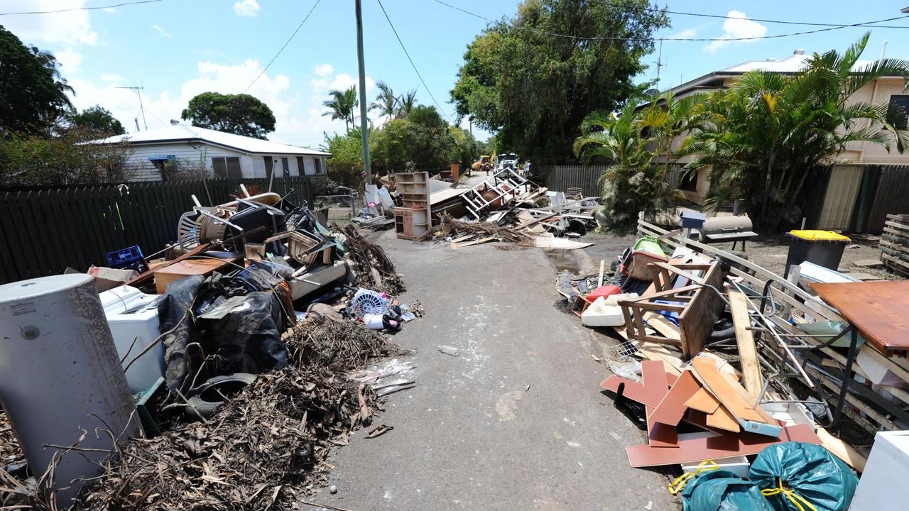 News Courier Mail, Bundaberg 3.2.2013, Normanby St Bundaberg is lined with flood rubbish. Photo Paul Beutel