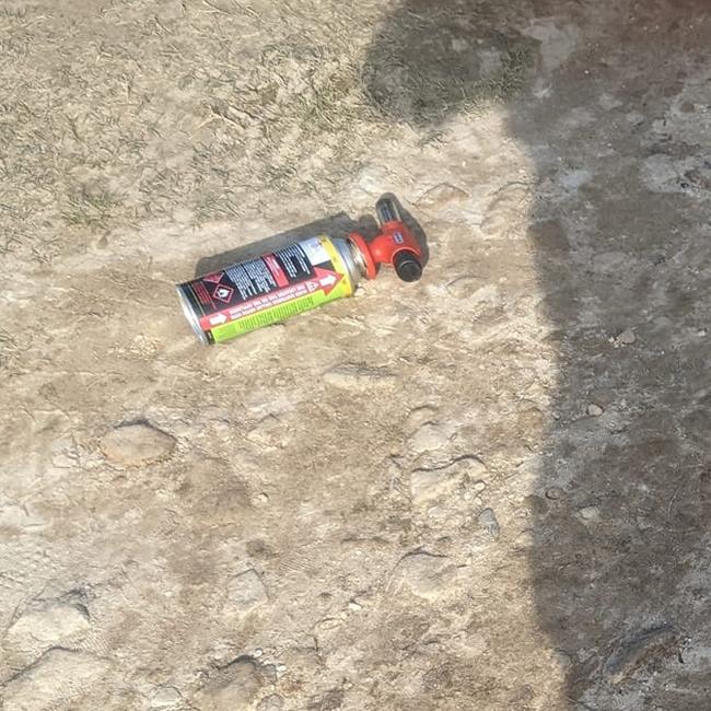 A butane gas lighter bottle was used found near the campsites. Picture: Facebook