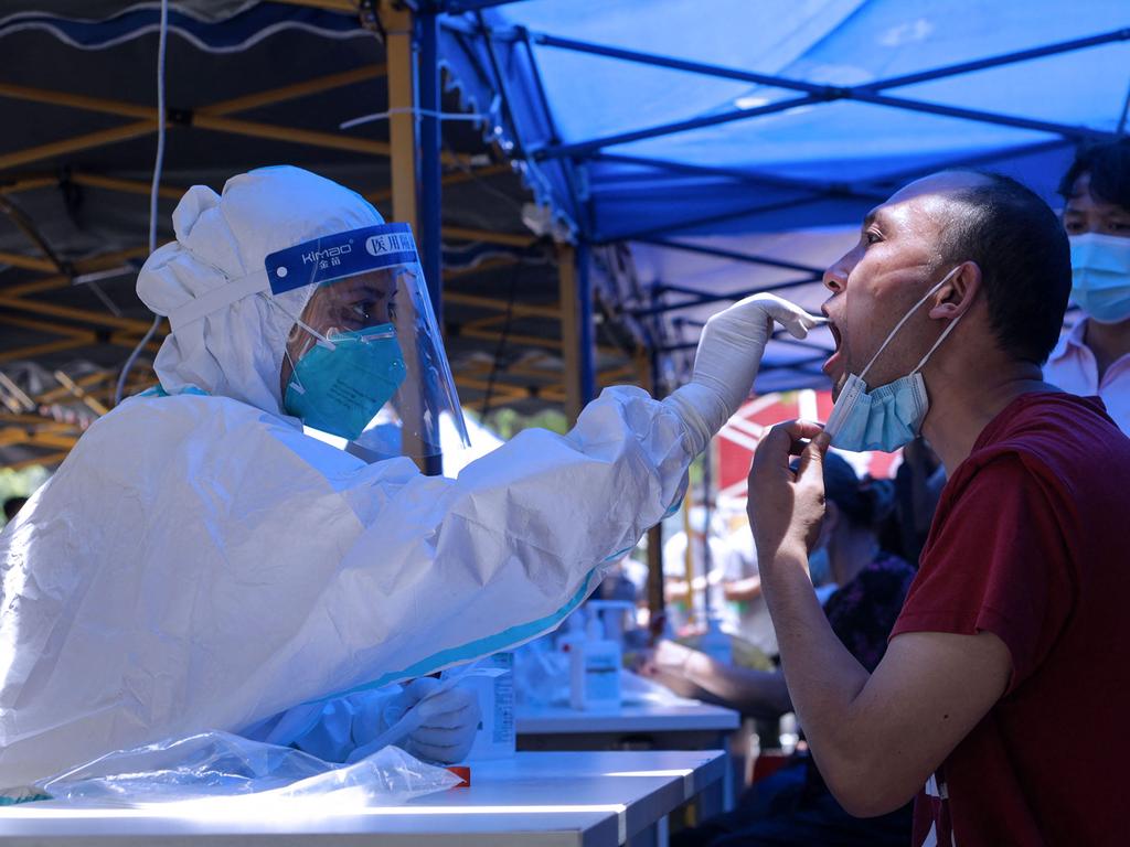 A man receiving a nucleic acid test for the Covid-19 coronavirus in Guangzhou in China's southern Guangdong province. Picture: AFP