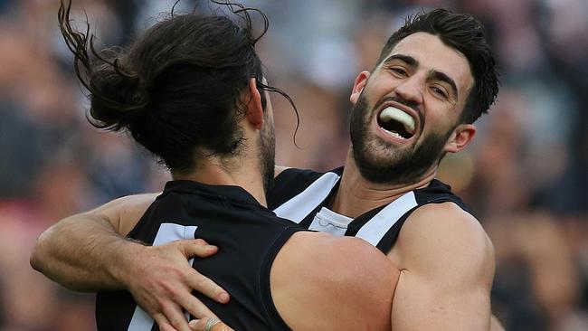 Brodie Grundy and Alex Fasolo celebrate a Collingwood goal. Picture: Wayne Ludbey