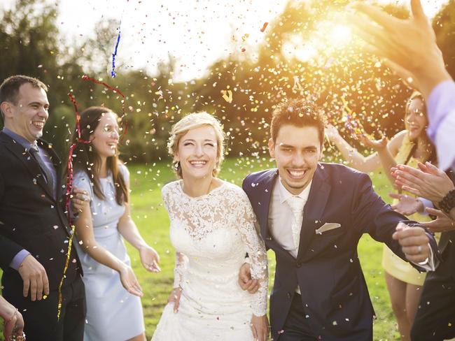 A couple on their wedding daySource: iStock / Getty Images