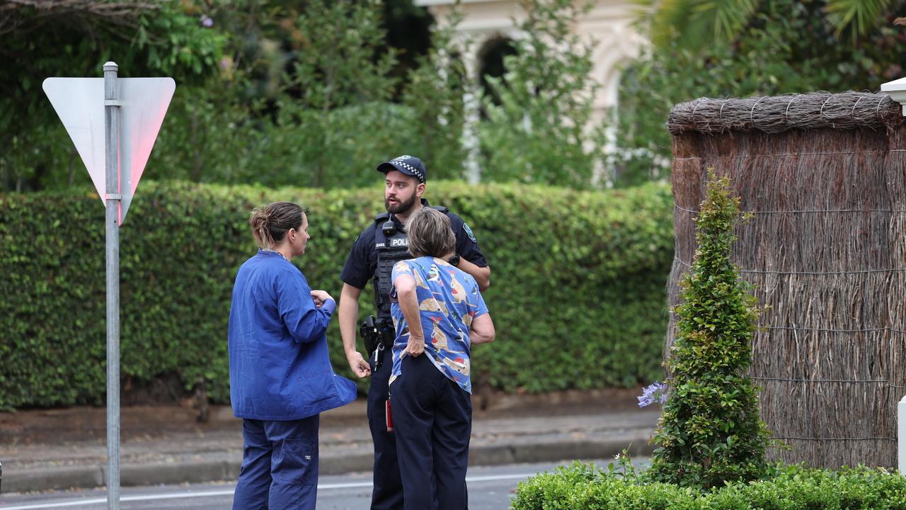 Police speak to residents outside a home in Gilberton. Picture: NCA NewsWire / David Mariuz.