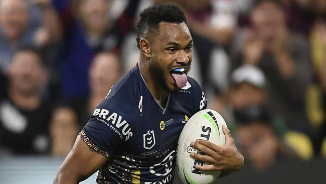 TOWNSVILLE, AUSTRALIA - MAY 28:  Hamiso Tabuai-Fidow of the Cowboys runs to score a try during the round 12 NRL match between the North Queensland Cowboys and the New Zealand Warriors at QCB Stadium, on May 28, 2021, in Townsville, Australia. (Photo by Ian Hitchcock/Getty Images)