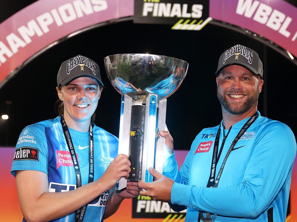 Strikers captain Tahlia McGrath and coach Luke Williams with the WBBL08 trophy. Picture: Mark Kolbe/Getty Images