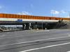 Driver critical, two charged after EastLink chaos