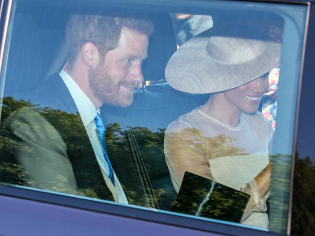 The couple pictured arriving for the event at Buckingham Palace. Picture: Ian Lawrence/MEGA