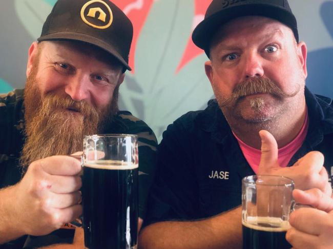 Big Shed owners Craig Basford and Jason Harris toast a good day’s sale of their BruChocs beer