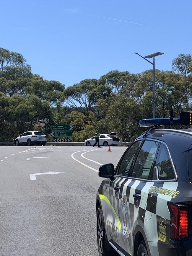 Police at the scene of the crash at Willunga Hill. Picture: Charlie Dadds