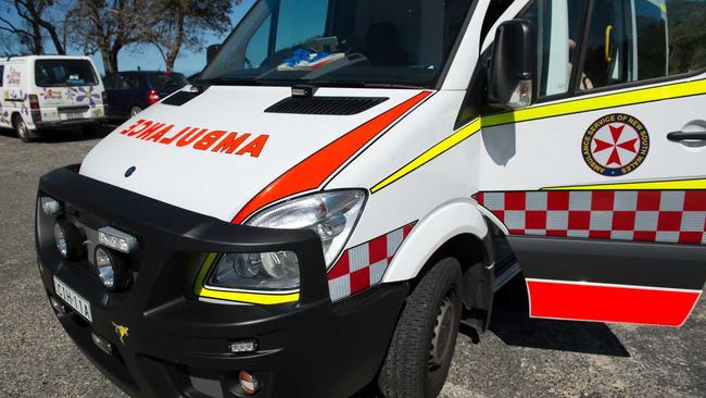 Ambulance paramedics rushed to the aid of a Bellingen man who collapsed in Saturday's oppressive heat. Picture: Trevor Veale