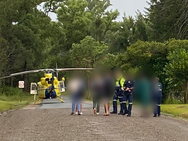 Family and pet dog airlifted out of rising flood water