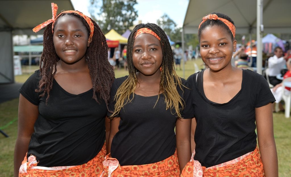 L-R Victoria Chitura, Nayasha Maminingo and Andile Gwebu at the Cultural Festival held at the Heritage Village on Sunday. Photo: Chris Ison / The Morning Bulletin. Picture: Chris Ison