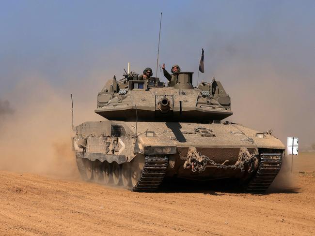 Israeli troops roll back from Gaza. Picture: AFP