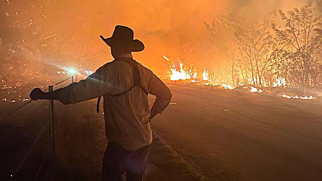 A volunteer firefighter labelled simply ‘Poster Boy’ takes a break during efforts to contain monster fire that has consumed 1200 hectares of outback bush west of Townsville in just two weeks. Picture: Torrens Creek Rural Fire Brigade