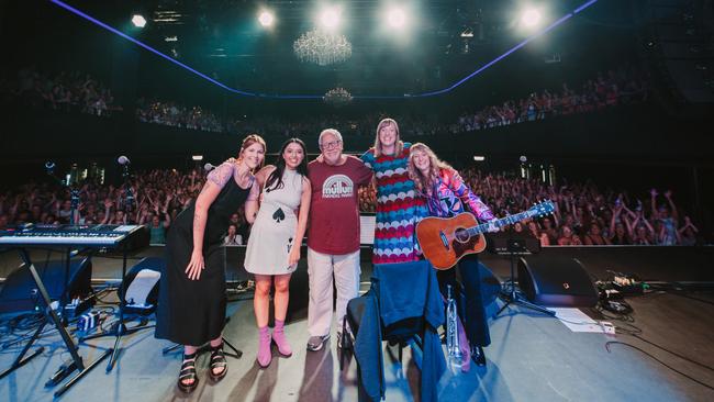 Pub Choir performers at The Fortitude Music Hall in Brisbane on March 29 2023, after a final performance of ABBA's song 'The Winner Takes It All' with about 2500 people. L-R: Madison Rossetto (Auslan interpreter), Astrid Jorgensen (Pub Choir director), John Hoffman (flugelhorn), Seja Vogel (synthesiser) and Dana Gehrman (guitar). Picture: Jacob Morrison