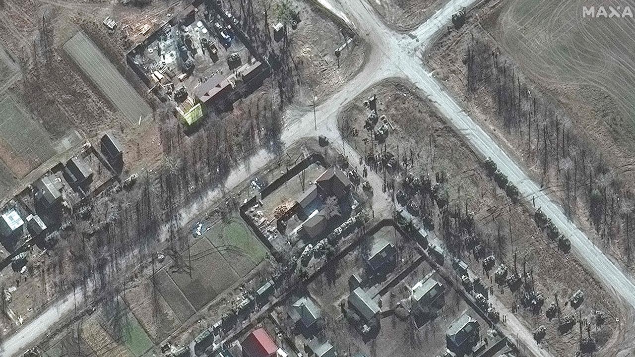 This Maxar satellite image taken and released on February 28, 2022, shows a closer view of a large deployment of ground forces in and around the town of Zdvyzhivka, Kyiv, Ukraine. Picture: Maxar Technologies/AFP