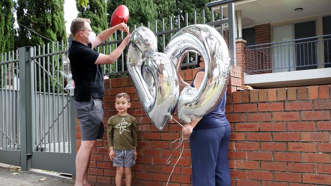 Supporters of outgoing Premier Gladys Berejiklian leave balloons at her home. Picture: Richard Dobson