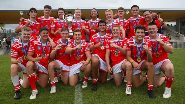 Champions. The Illawarra South Coast Dragons celebrate win in the Laurie Daley SLE Cup Grand Final. Picture: Sue Graham