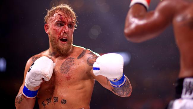 TAMPA, FLORIDA – DECEMBER 18: Jake Paul fights Tyron Woddley during a Paul Woodley II on December 18, 2021 in Tampa, Florida. Mike Ehrmann/Getty Images/AFP == FOR NEWSPAPERS, INTERNET, TELCOS &amp; TELEVISION USE ONLY ==