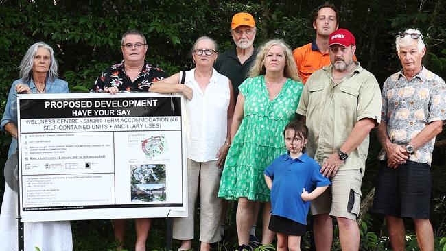 Yorkeys Knob residents are fighting a development application before Cairns Regional Council to build short term accommodation on Buckley St. Lyndell Bourke, Adrian Gover, Marja-Leena Malinen, Peter Tuke, Nicola Strange, Andrew Hamilton, Katya Sheen, 5, David Sheen and Dr. Michael Powell are among those opposed to the proposed wellness centre. Picture: Brendan Radke