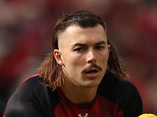 MELBOURNE, AUSTRALIA - APRIL 25: Sam Draper of the Bombers warms up prior to the round seven AFL match between Essendon Bombers and Collingwood Magpies at Melbourne Cricket Ground, on April 25, 2024, in Melbourne, Australia. (Photo by Robert Cianflone/Getty Images)