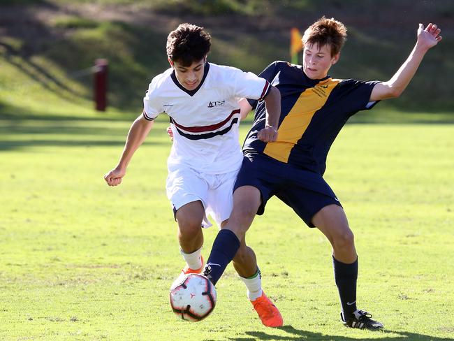 GPS first XI football (soccer) - The Southport School (white) vs. Toowoomba Grammar School from at Village Green, Winchester Street, Southport.Photo of Dimarco (TSS) and McLeod.Photo by Richard Gosling