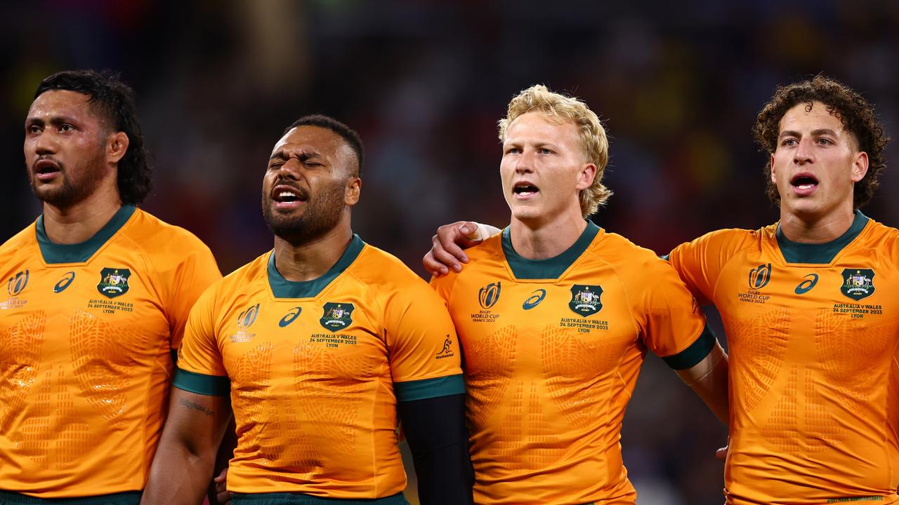 LYON, FRANCE – SEPTEMBER 24: Robert Leota, Samu Kerevi, Carter Gordon, Mark Nawaqanitawase of Australia line up during the National Anthems prior to the Rugby World Cup France 2023 match between Wales and Australia at Parc Olympique on September 24, 2023 in Lyon, France. (Photo by Chris Hyde/Getty Images)