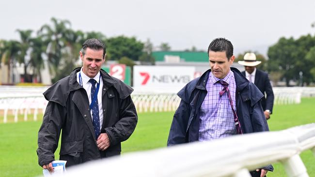 Stewards inspect the Gold Coast track before calling off the Magic Millions meeting. Picture: Grant Peters–Trackside Photography