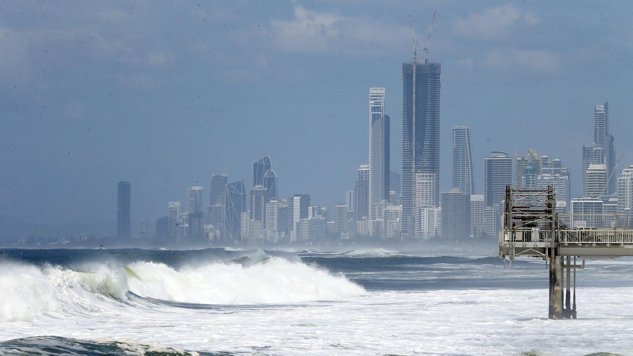 Gold Coast seaway rescue after boat capsizes leaving two in the water ...