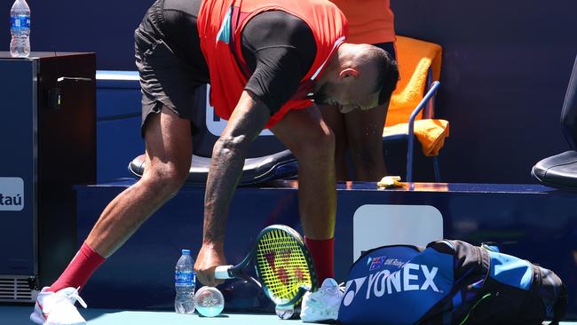 Nick Kyrgios slams his racket in his match against Jannik Sinner of Italy during the Miami Open. Photo: Getty Images