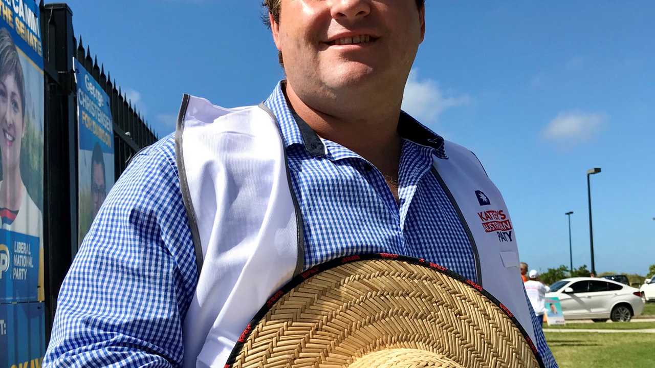 Katter's Australian Party candidate Brendan Bunyan greeting voters at the Mackay Northern Beaches High School polling station. Picture: Angela Seng