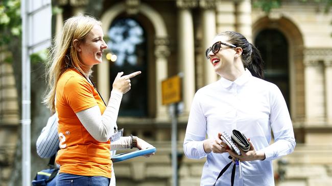 <i>Central Sydney</i> reporter Heather McNab is stoped in the street by a chugger. Picture: John Appleyard