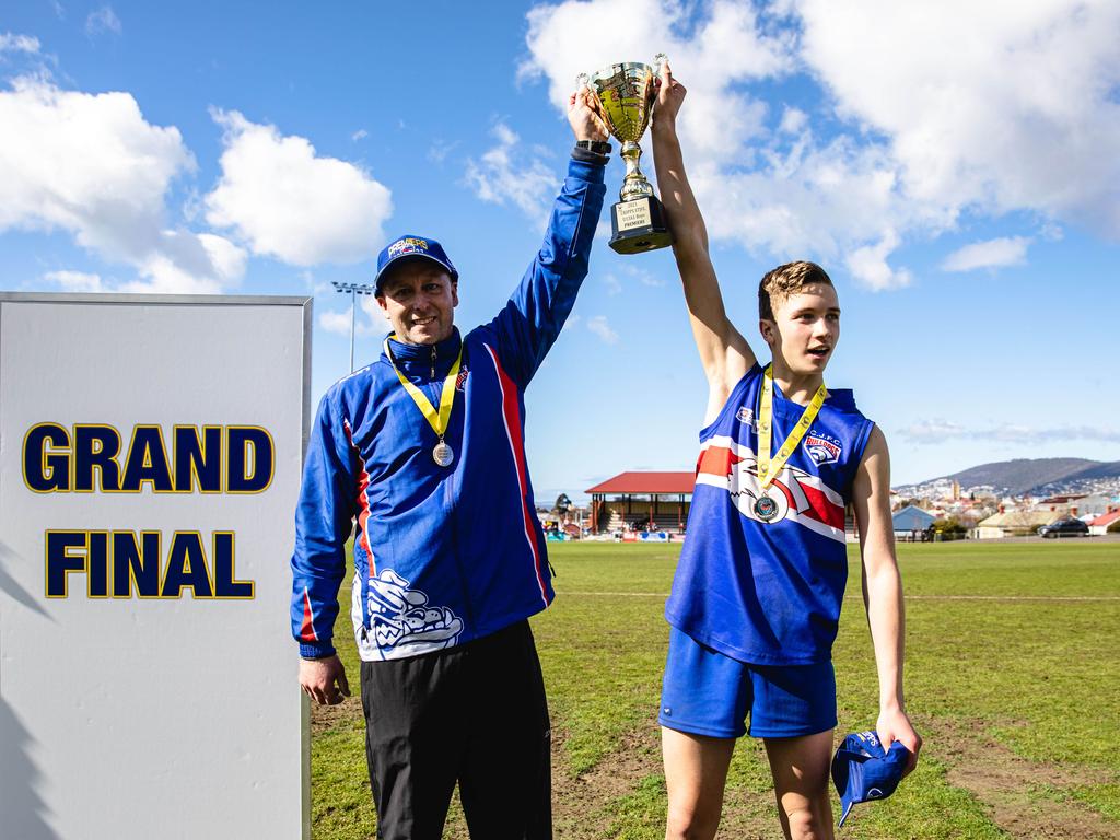 STJFA Grand Finals: Claremont coach Garry Barwick and captain Ben Barwick lift the trophy Picture: Linda Higginson