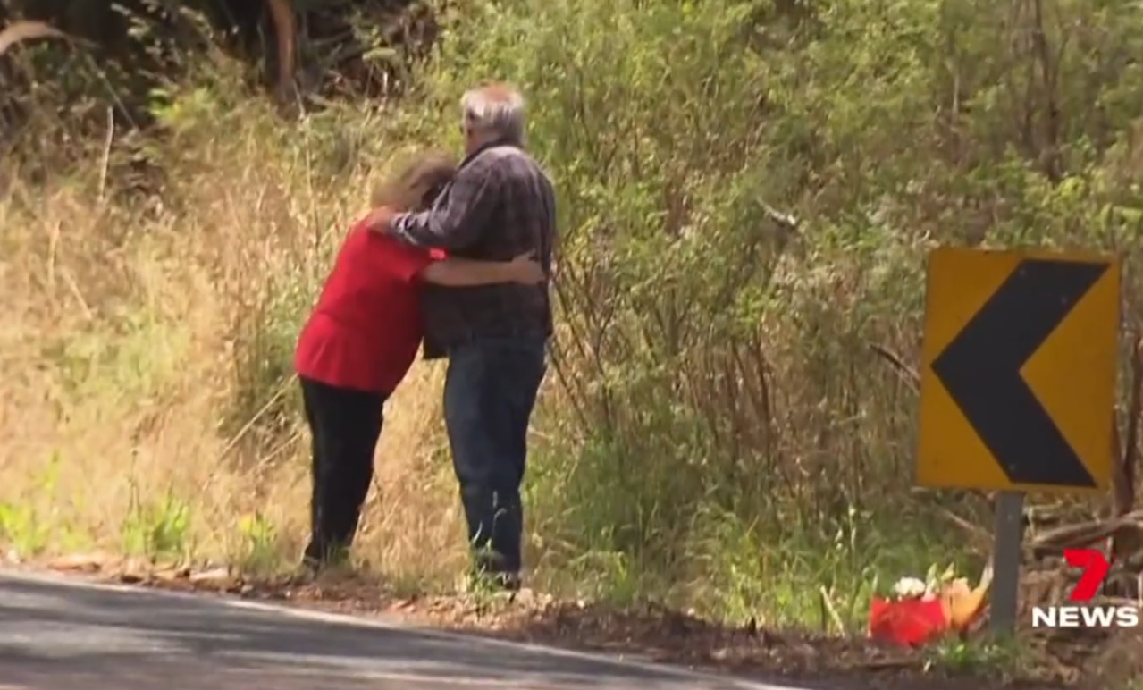 Jeannette Rice, whose grandson Tyson-Cox Rice died in a car crash, embracing her husband at the crash site the next day. Picture: 7NEWS