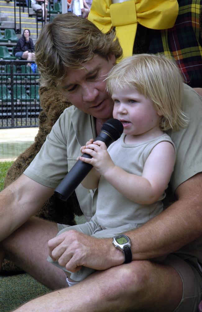 Robert Irwin with his late father Steve Irwin at the age of two. Picture: Lou O'Brien