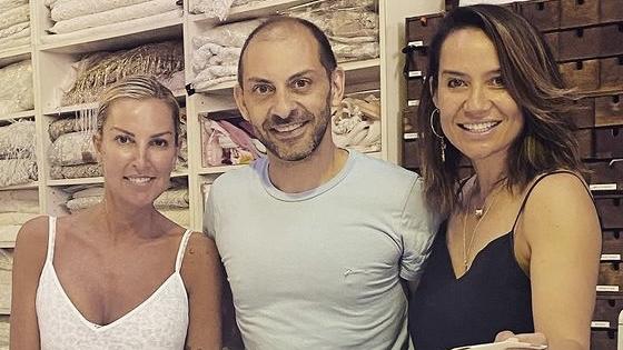 Tania Buckley with Jason Grech and friend Leilani Abels look at wedding dresses.