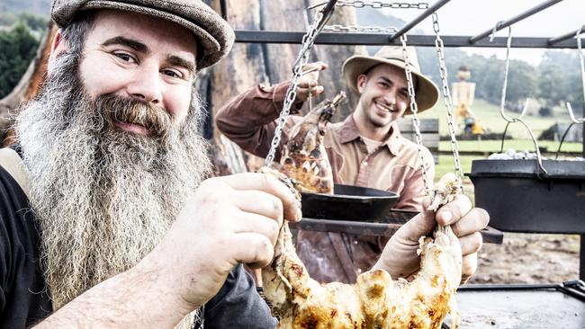 Jimi Anderson of Season and Fire with Ned Long of Wildgrove Farm Kitchen testing out the BBQ ahead of the Huon Valley Mid Winter Festival.  Picture: EDDIE SAFARIK