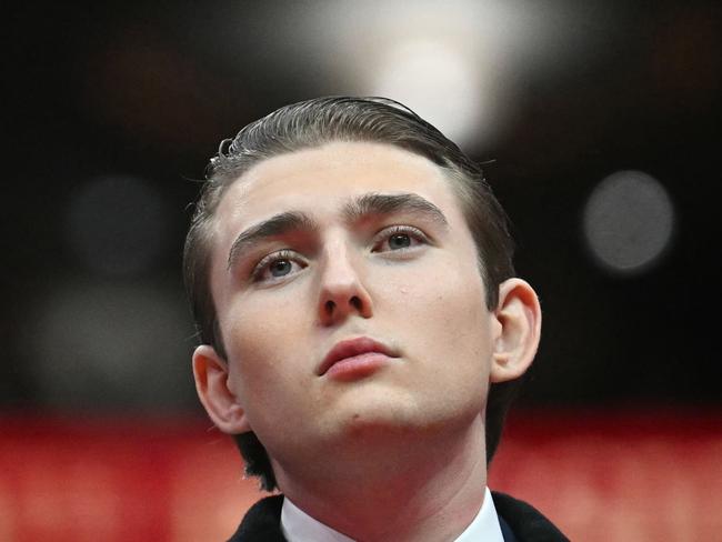 US President Donald Trump' son Barron Trump looks on during the inaugural parade inside Capital One Arena, in Washington, DC, on January 20, 2025. (Photo by Jim WATSON / AFP)