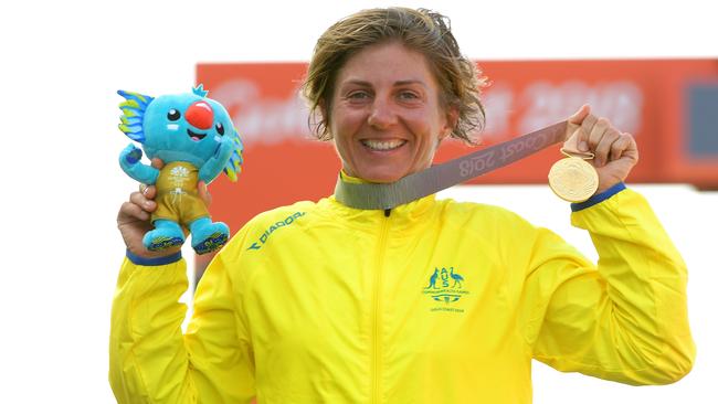 Katrin Garfoot celebrates her gold medal win in the time trial.