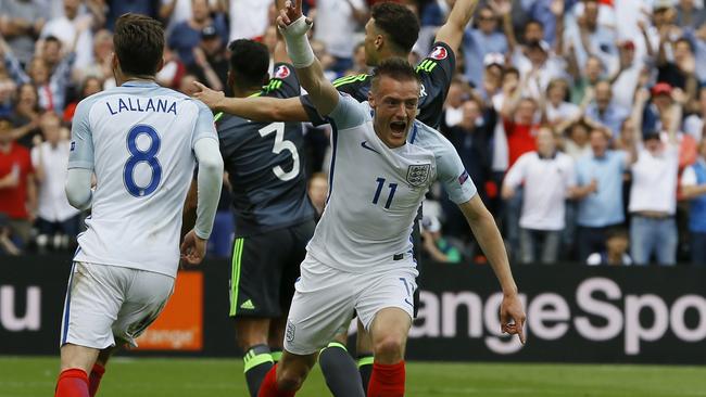 England's Jamie Vardy, front right, celebrates after scoring his side’s first goal.