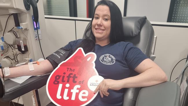 Devon Meadows CFA volunteer Carly Damman donating blood during The Emergency Services Blood Challenge, that is running throughout winter, image: CFA media