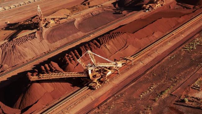 Iron ore being stockpiled for export at Port Hedland in Western Australia. (Image: AFP)